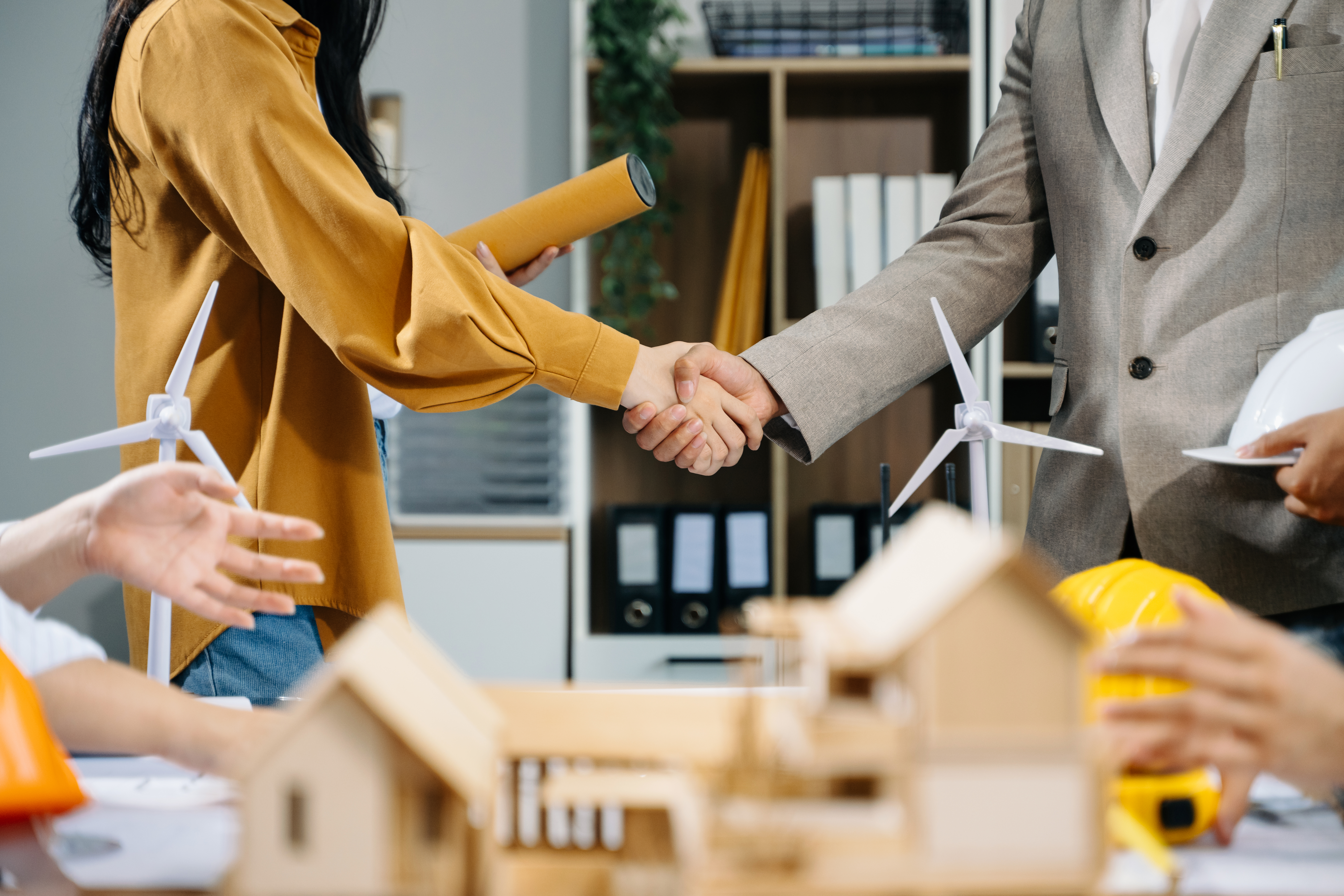 Business professionals shaking hands